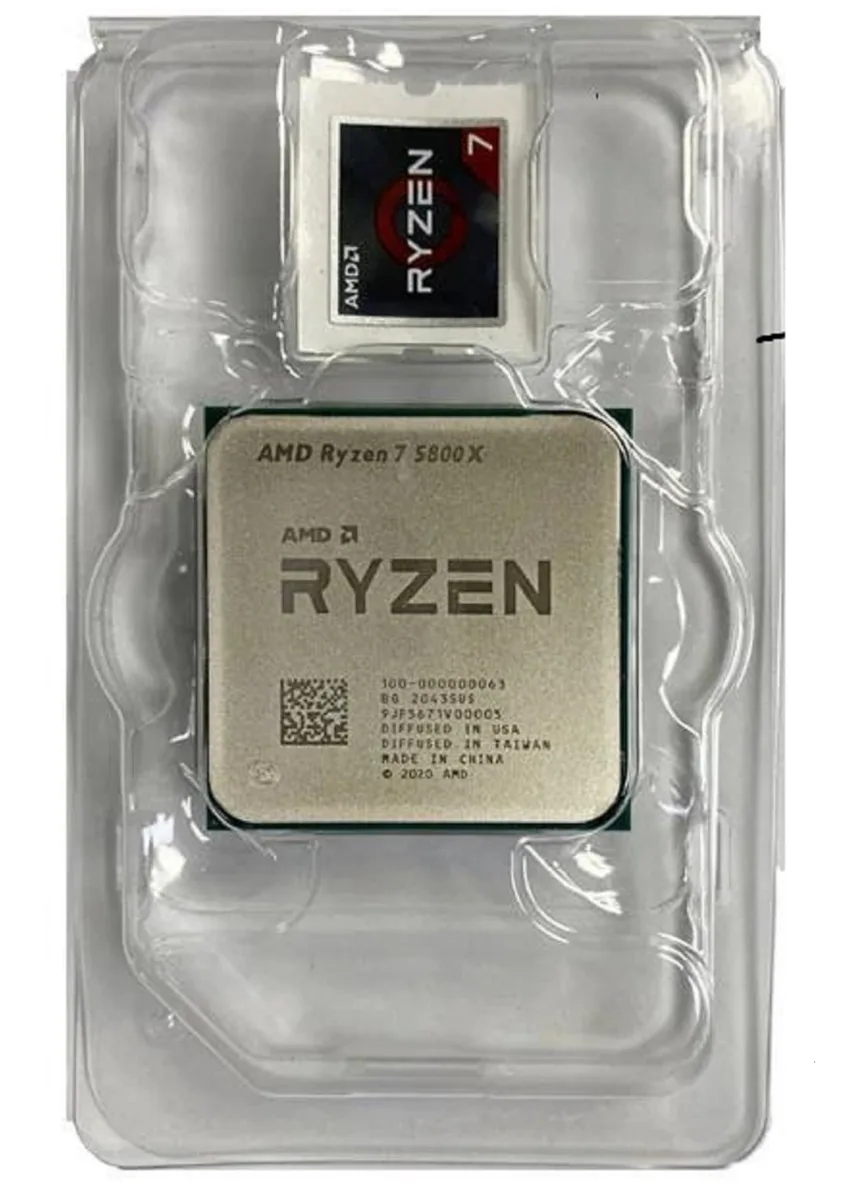 Square green ceramic CPU with gold contact pads and silver metal heat spreader engraved Ryzen 7 5800X