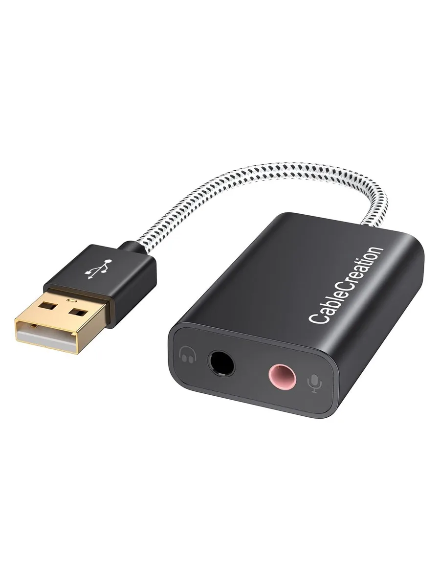 Small black USB-A dongle with pink and black 3.5 mm jacks on a short cable