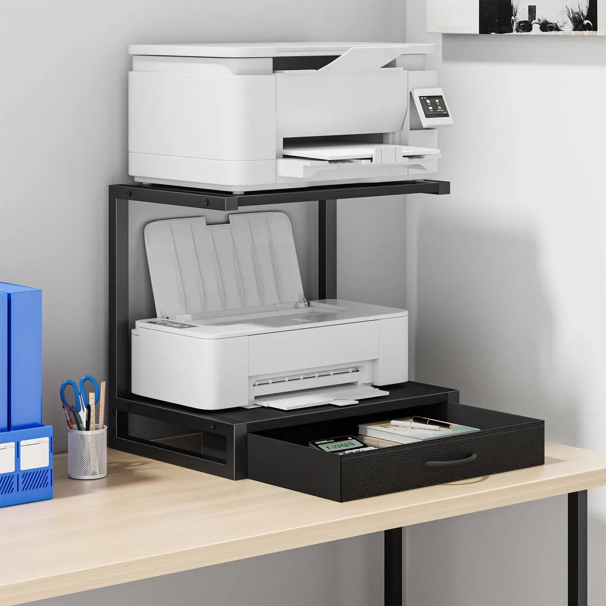Black two-tier printer stand with metal frame, fabric drawer and open lower shelf