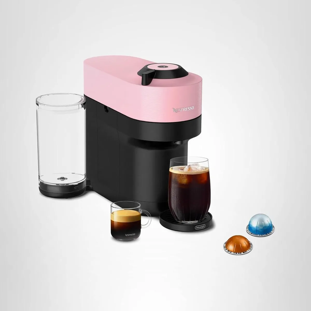 Compact Candy Pink espresso machine with rounded corners and removable water tank