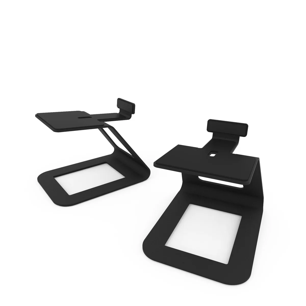 Pair of black steel desktop speaker stands with angled top platforms and silicone pads