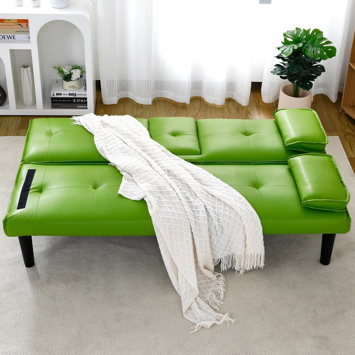 Green PVC sofa bed, 67 inches wide, foldable with built-in cup holder