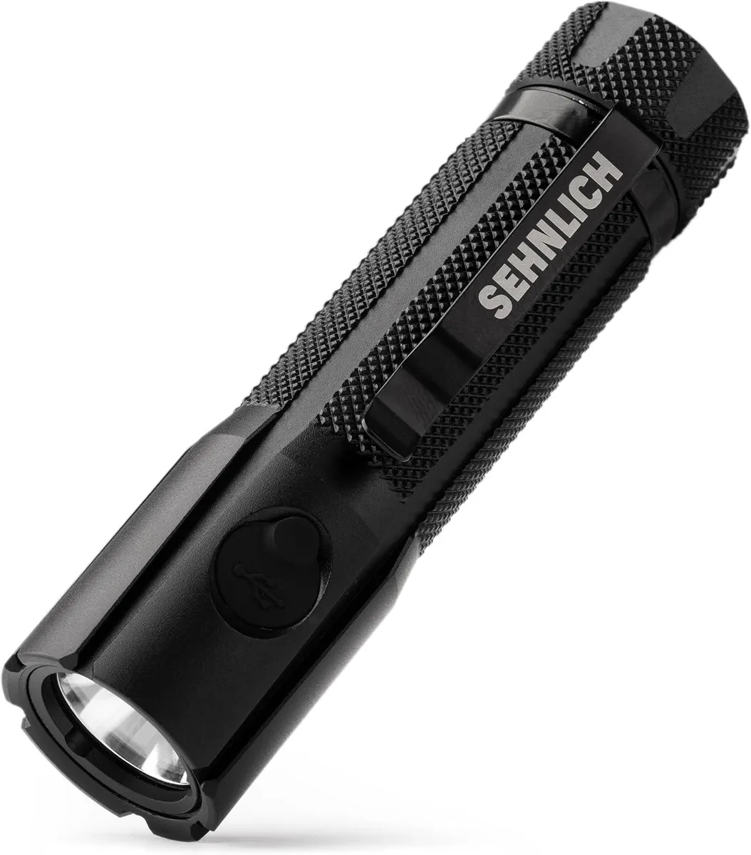 Black cylindrical flashlight with USB-C port and pocket clip