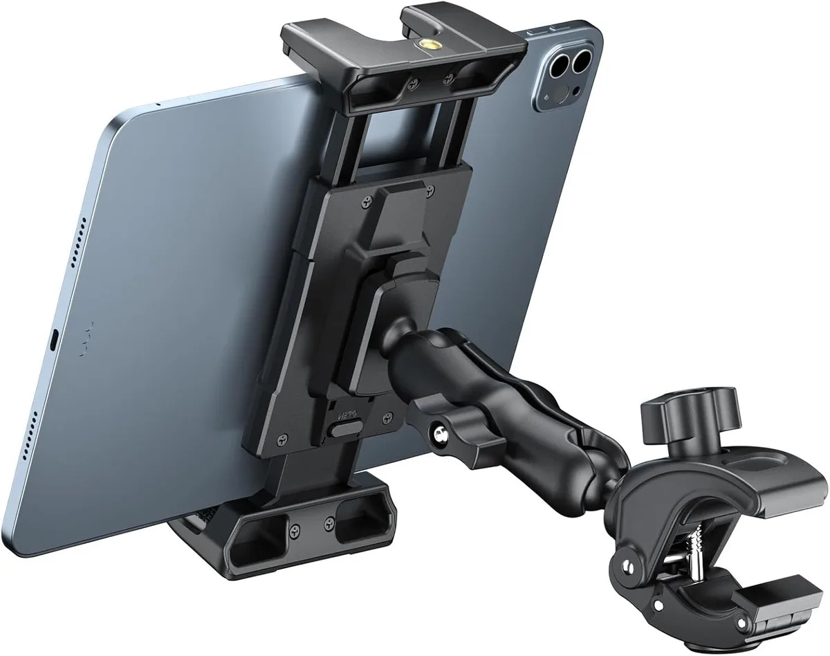 Black clamp mount with dual ball joints holding a tablet in landscape orientation