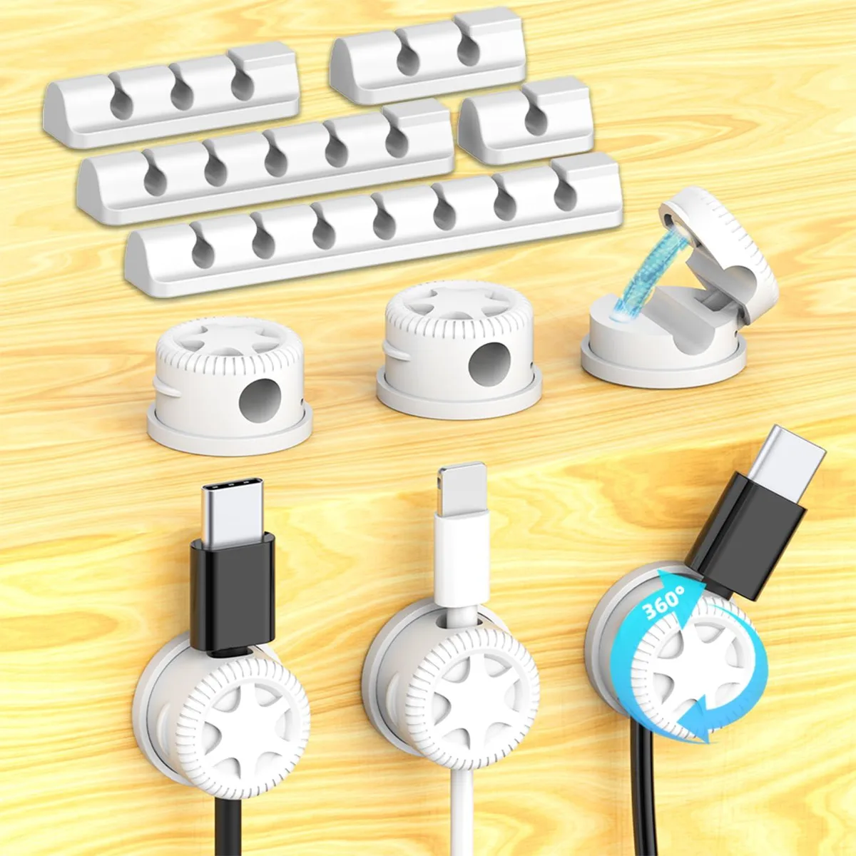 Eleven white magnetic and silicone cable clips in a compact box