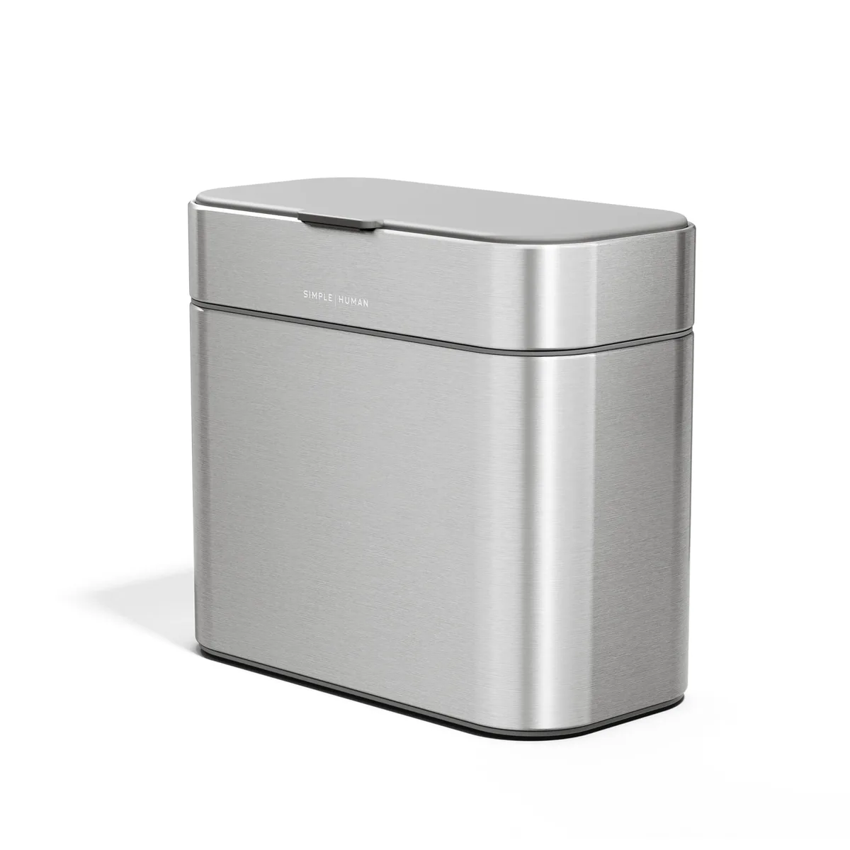 Three white plastic compost caddies with lids and magnetic docks