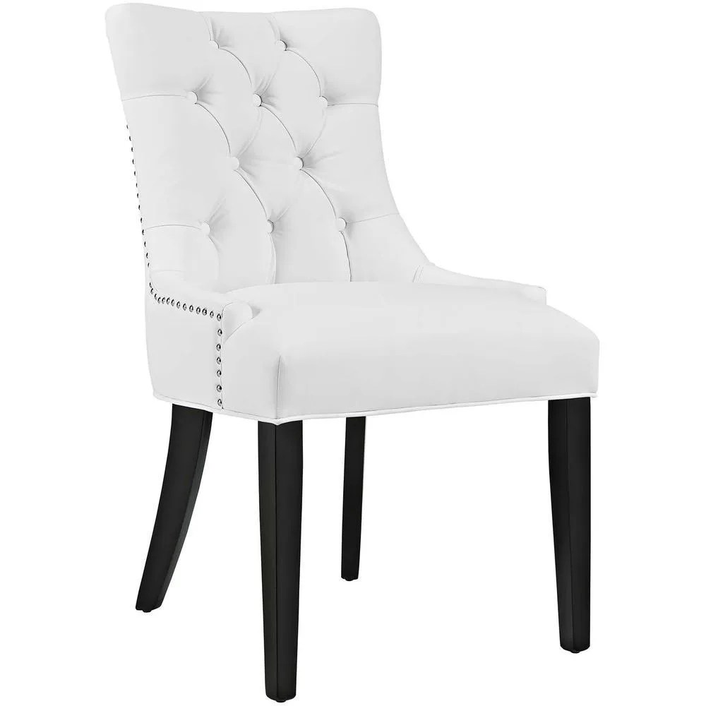 White vinyl dining chair with tufted back, nailhead trim, black rubberwood legs