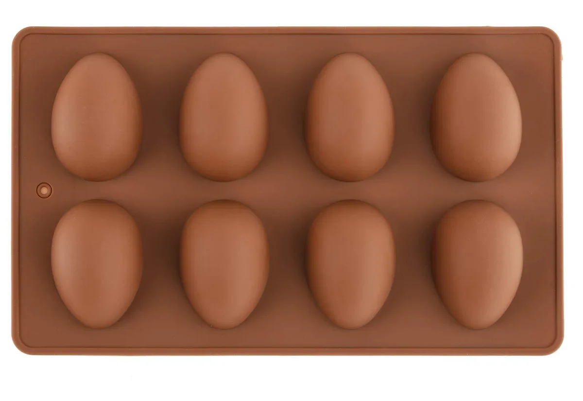 Rectangular light-coloured silicone tray with eight oval cavities