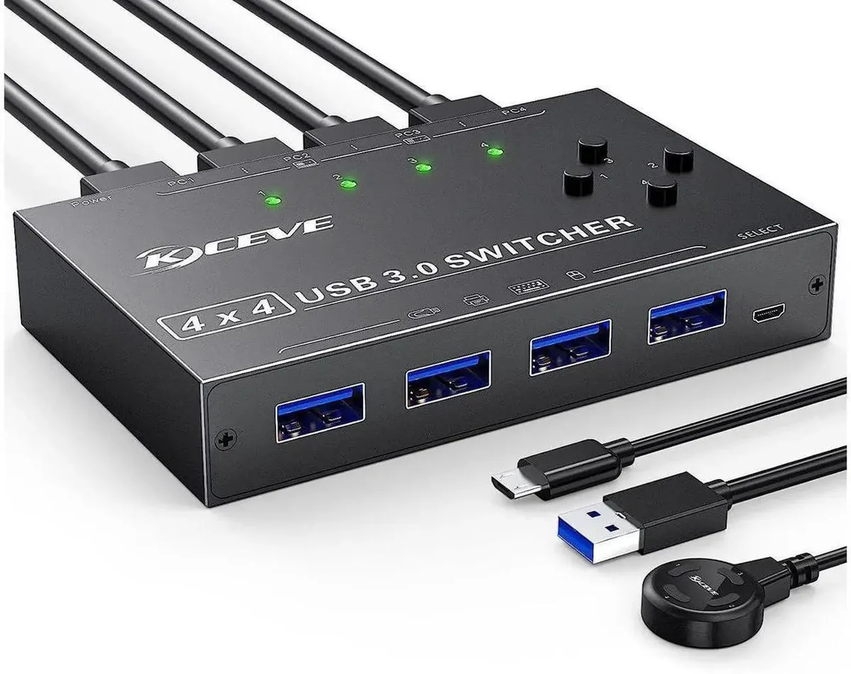 A compact black box with four USB ports and a wired remote control button