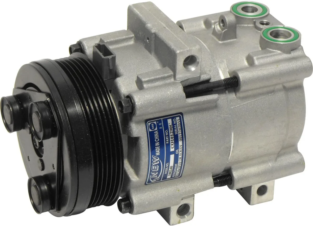 Grey cylindrical automotive A/C compressor with clutch and pulley assembly