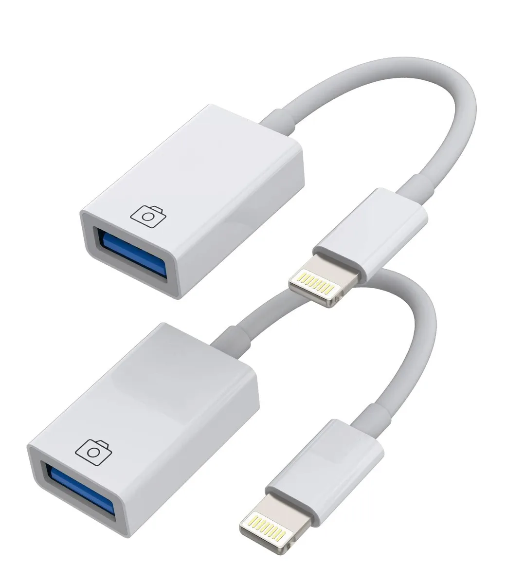 Two small white Lightning-to-USB-A adapters side by side