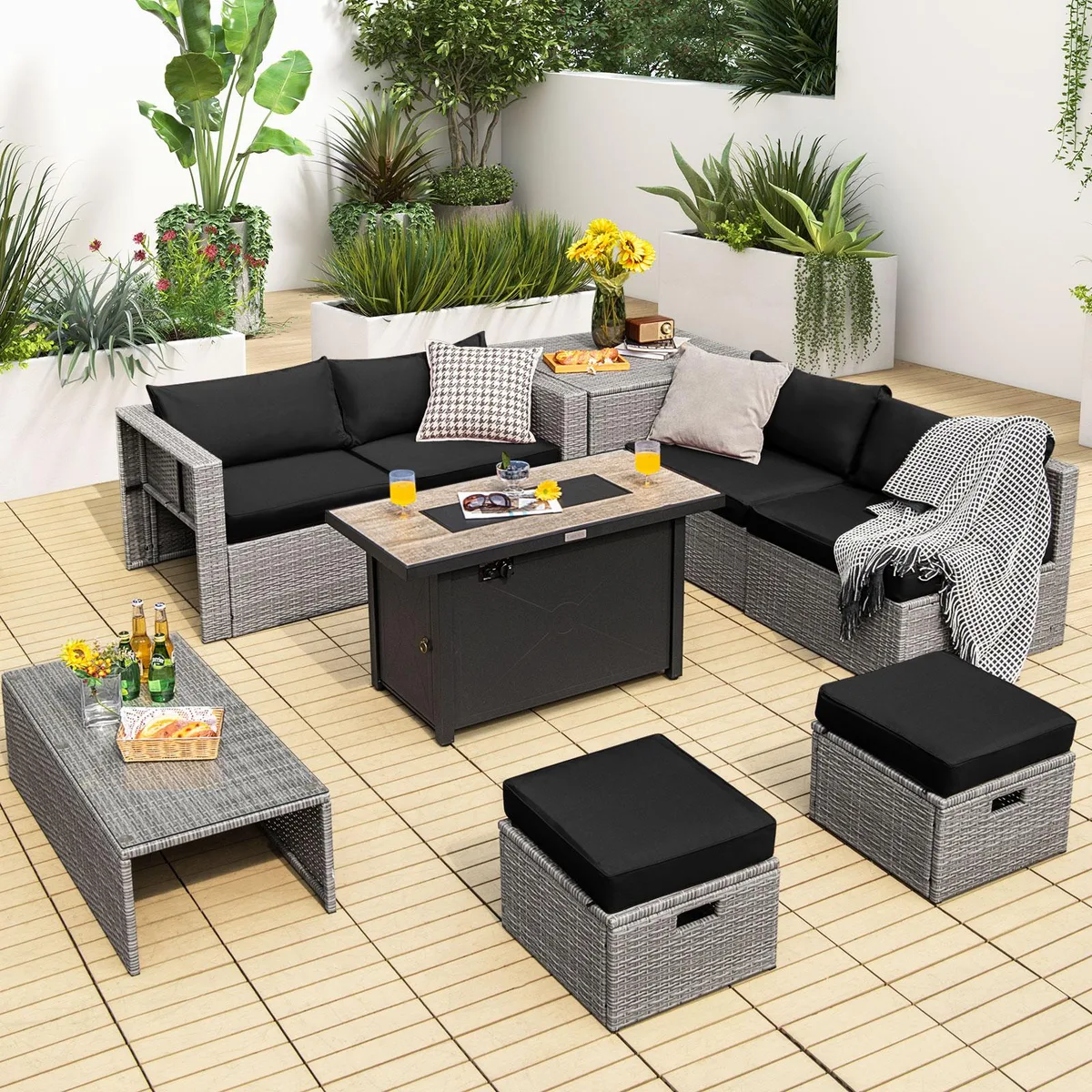 Black 9-piece patio set with grey rattan seating, fire pit table, coffee table and storage box