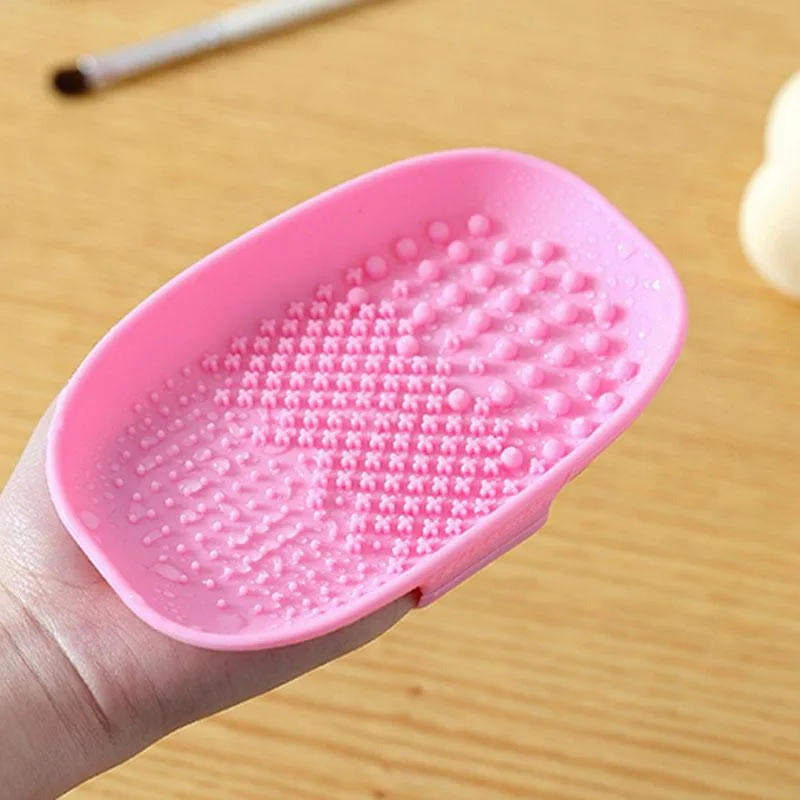 DAXINQI DAXINQI Oval Silicone Makeup Brush Cleaner Mat Pink 15.2x9cm 75g — product photo