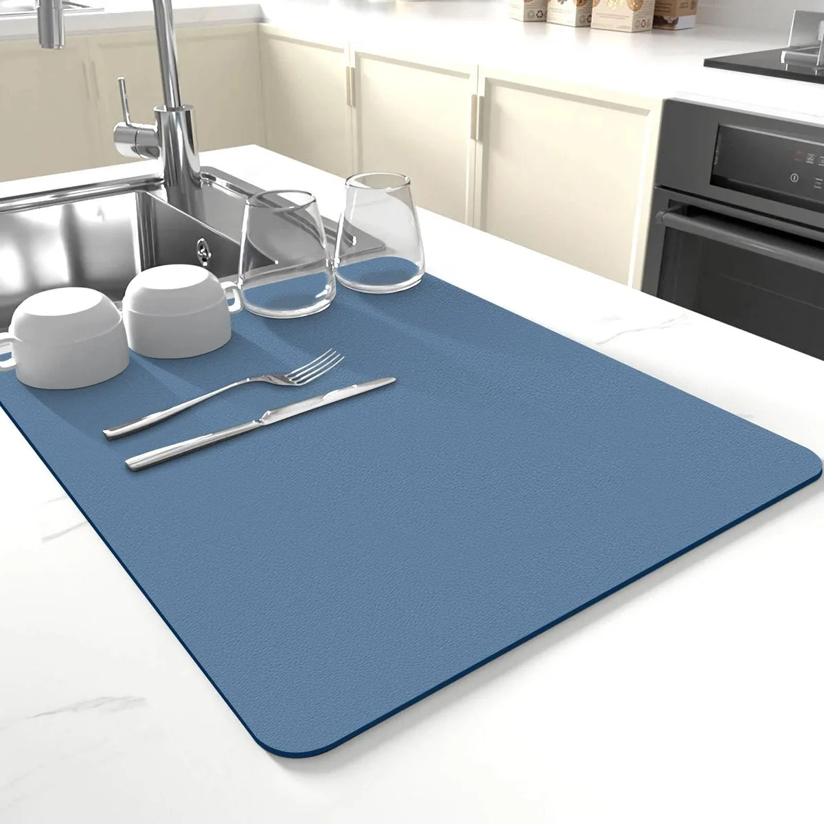 Rectangular blue kitchen mat, 12 by 19 inches, soft absorbent surface with rubber backing