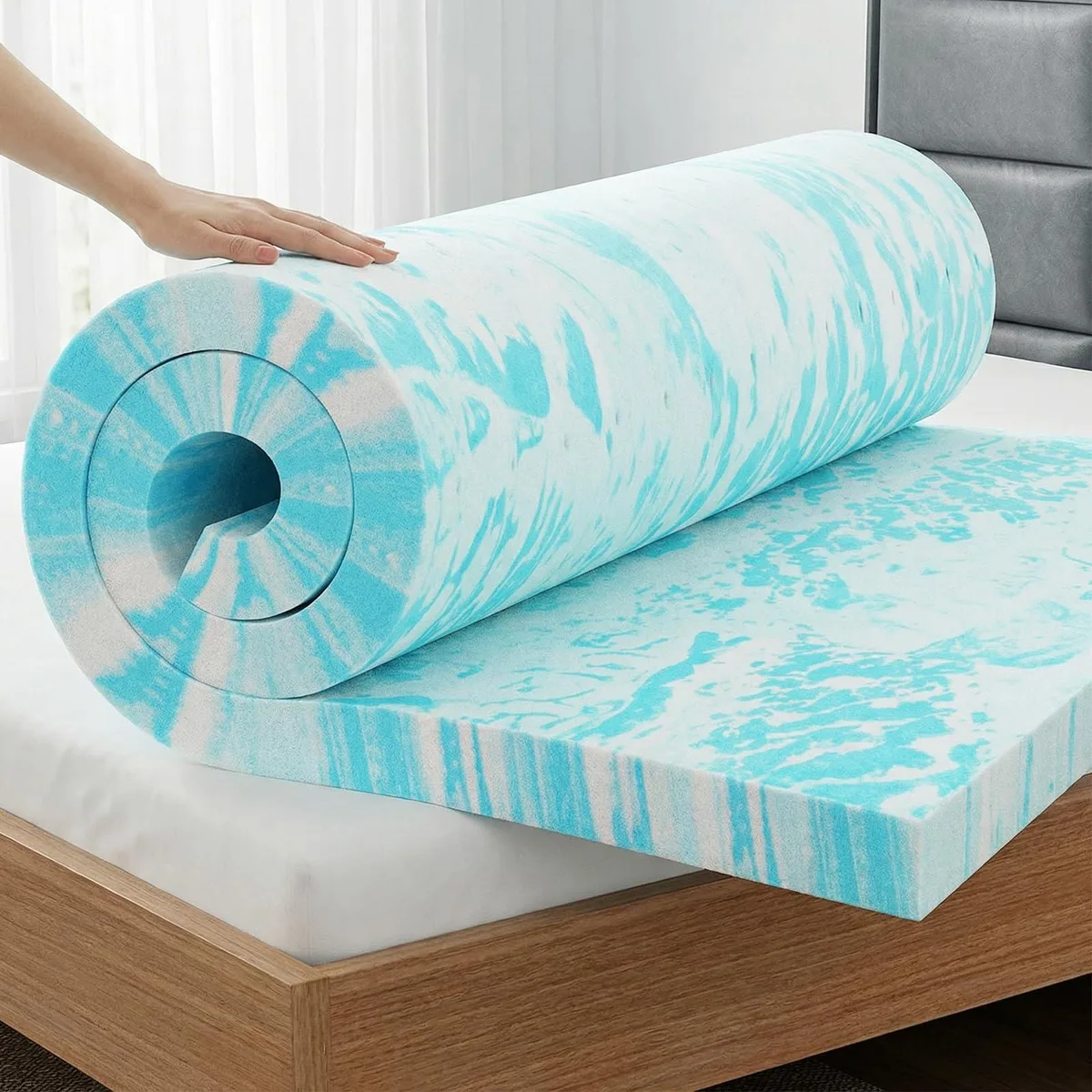 White rectangular queen-size mattress topper, two inches thick, gel-infused memory foam with open-cell texture
