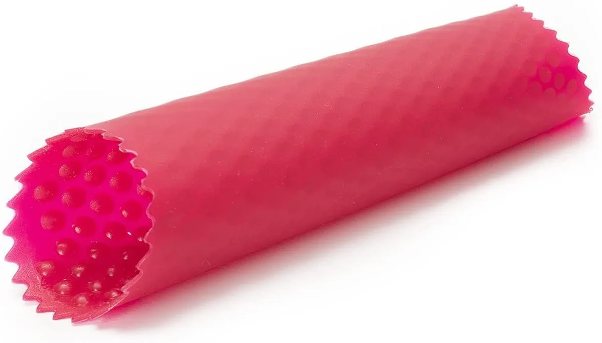 Red silicone tube roller for peeling garlic cloves