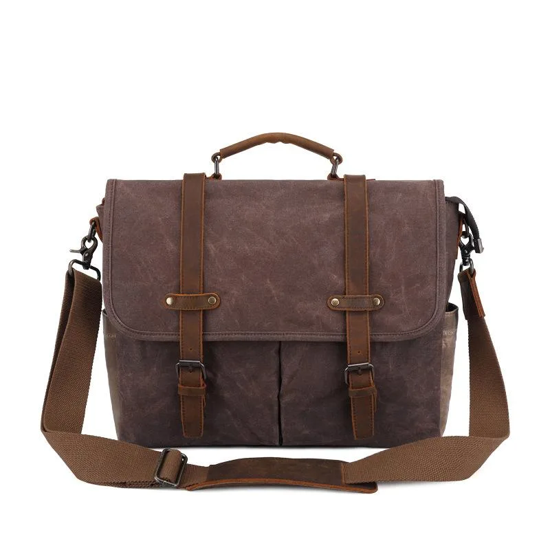 Brown leather and canvas shoulder bag with magnetic snaps, padded laptop sleeve, adjustable strap and multiple pockets