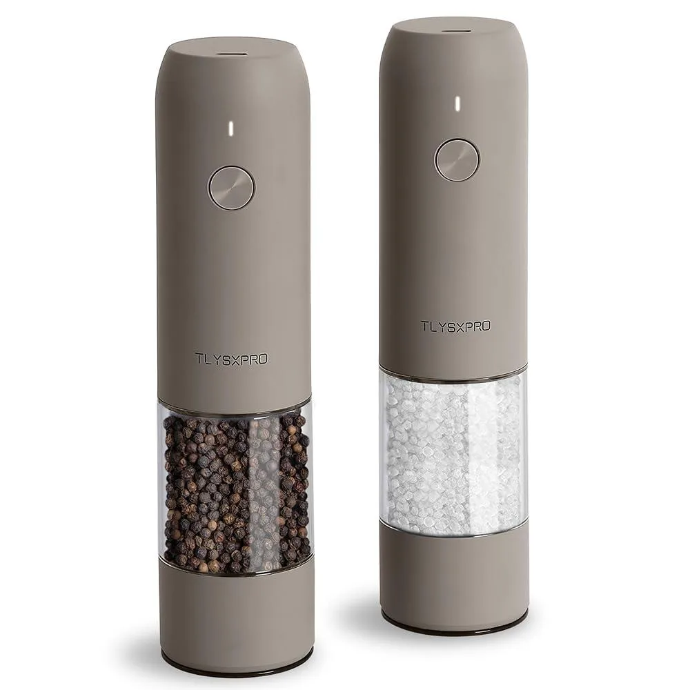 Two silver electric grinders, cylindrical, USB-C rechargeable, LED base