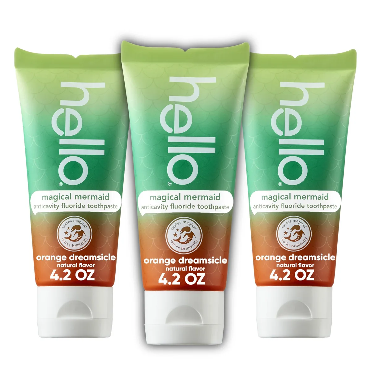 Three white 4.2 oz toothpaste tubes in a pack