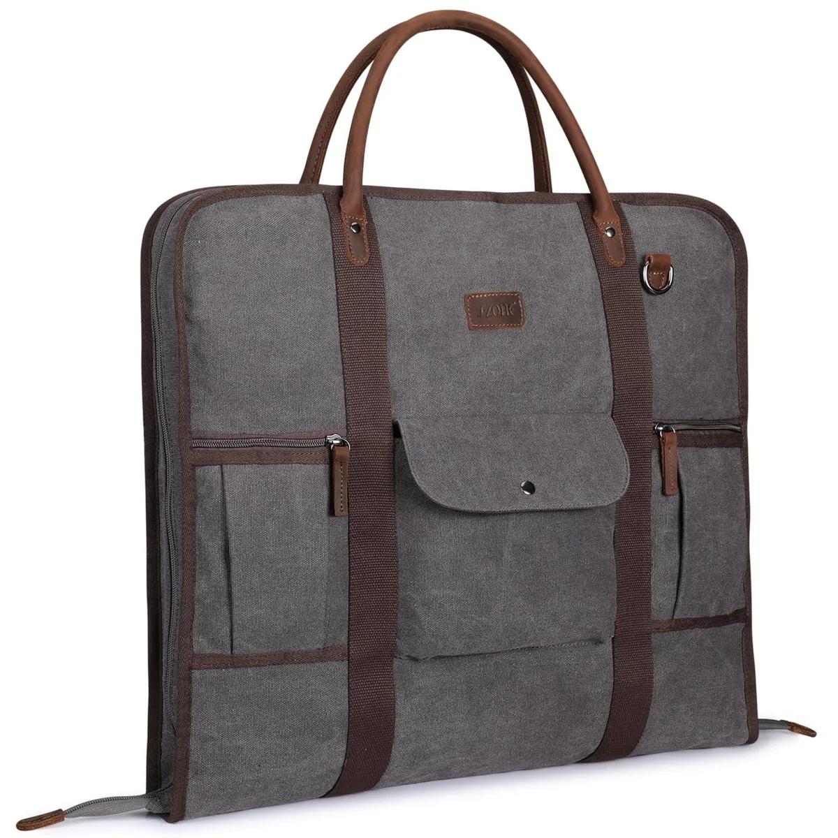 Beige canvas garment bag with leather handles and adjustable shoulder strap, folded rectangular shape