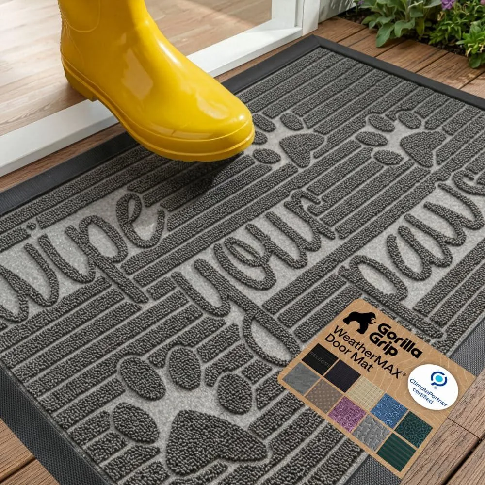 Rectangular stone-coloured rubber doormat with paw-print pattern, low profile, 29 by 17 inches