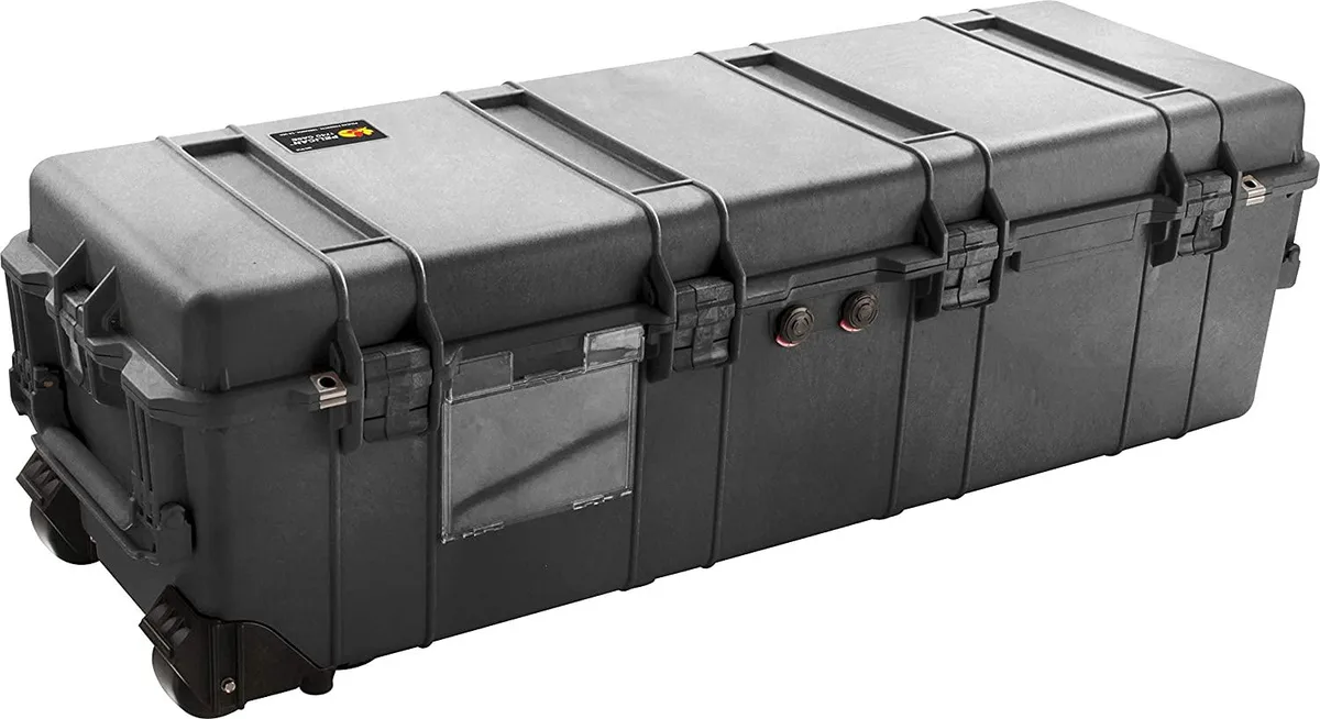 Black Pelican 1740 camera case with foam, rectangular hard shell, double-throw latches, wheels and handle