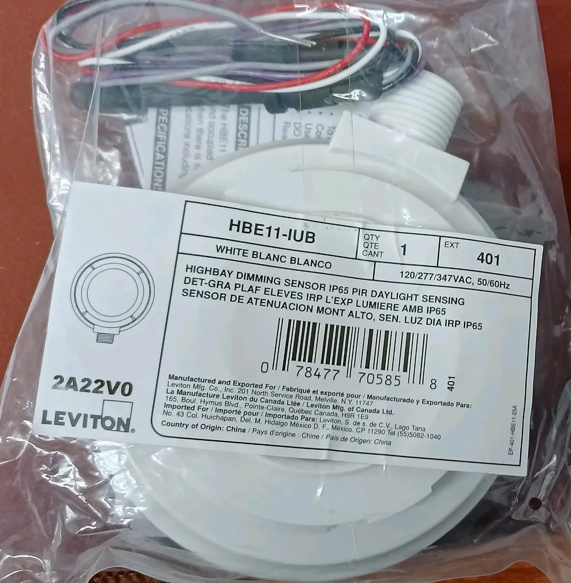 White rectangular fixture-mount sensor with IP65 rating