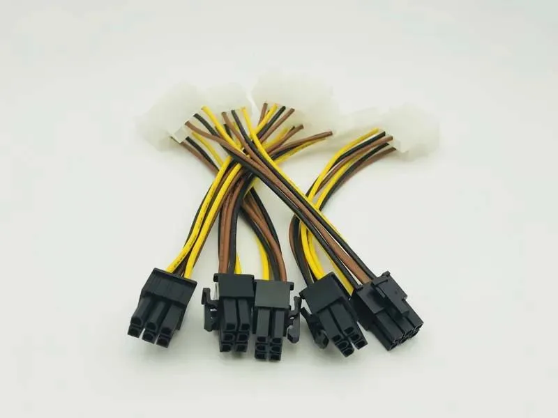 Five black dual Molex to PCIe power cables coiled together