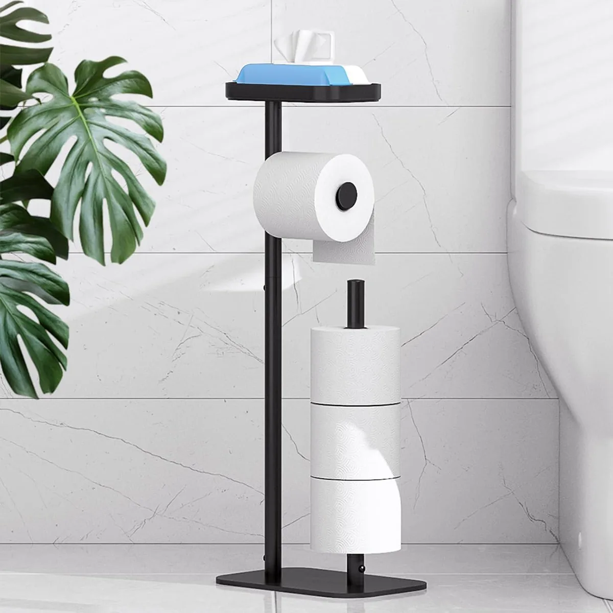 Freestanding metal toilet paper holder with storage shelf, matte black finish