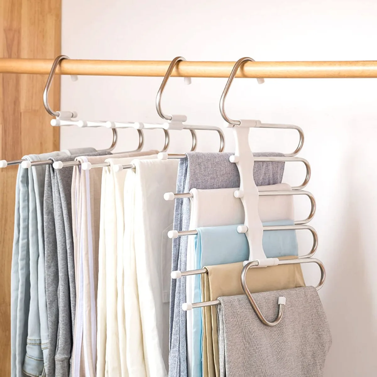 Two white metal pants hangers with open rods and non-slip coating, pack of 2