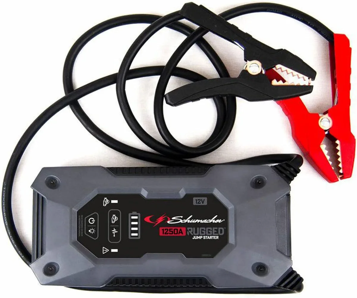 Compact black jump starter unit with clamp cables and USB port