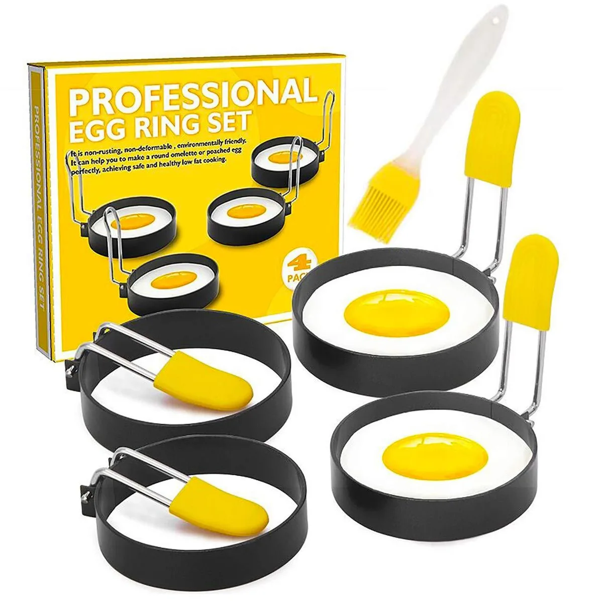 Four round stainless steel egg rings with insulated handles and an oil brush