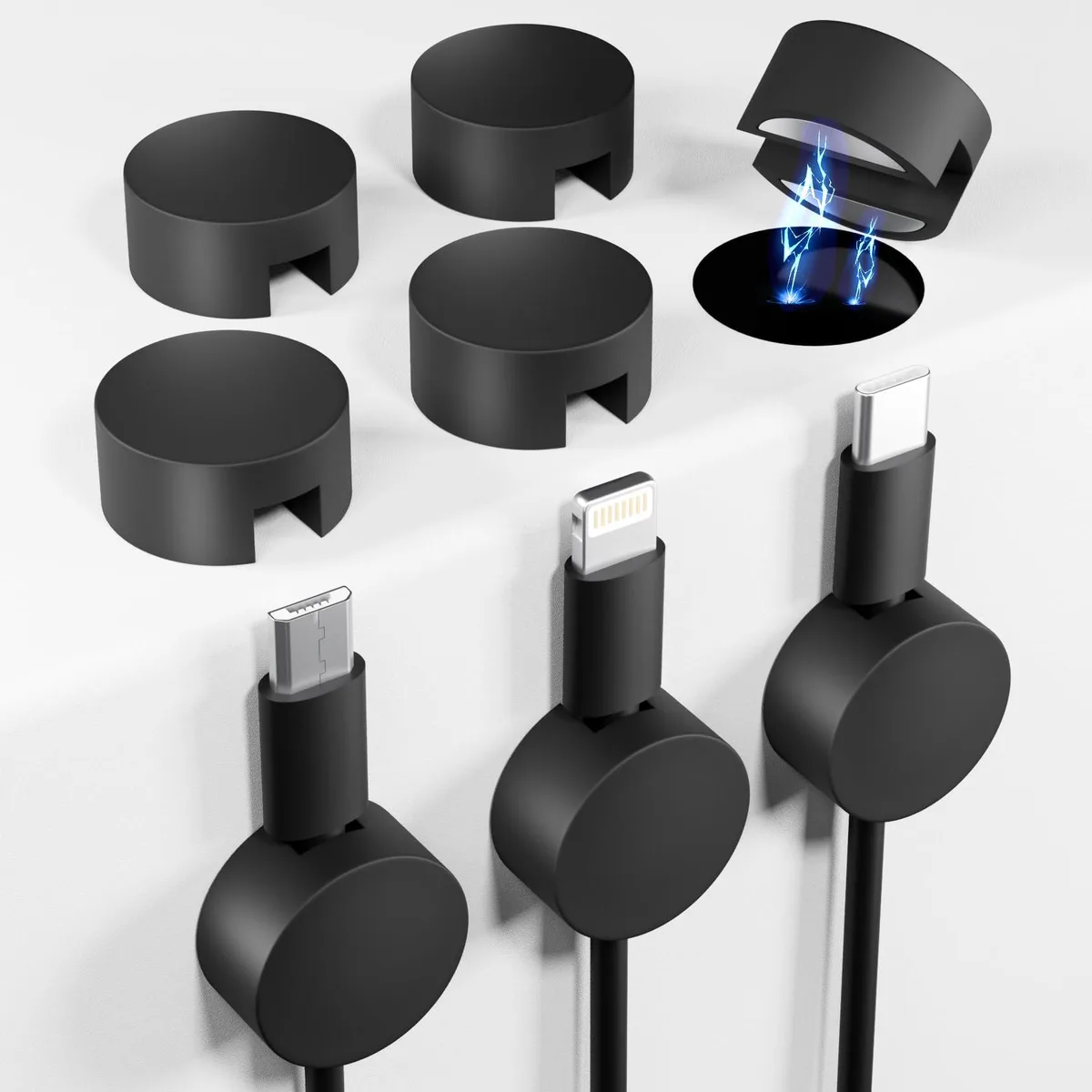 Eight small black silicone magnetic cable clips with adhesive metal plates