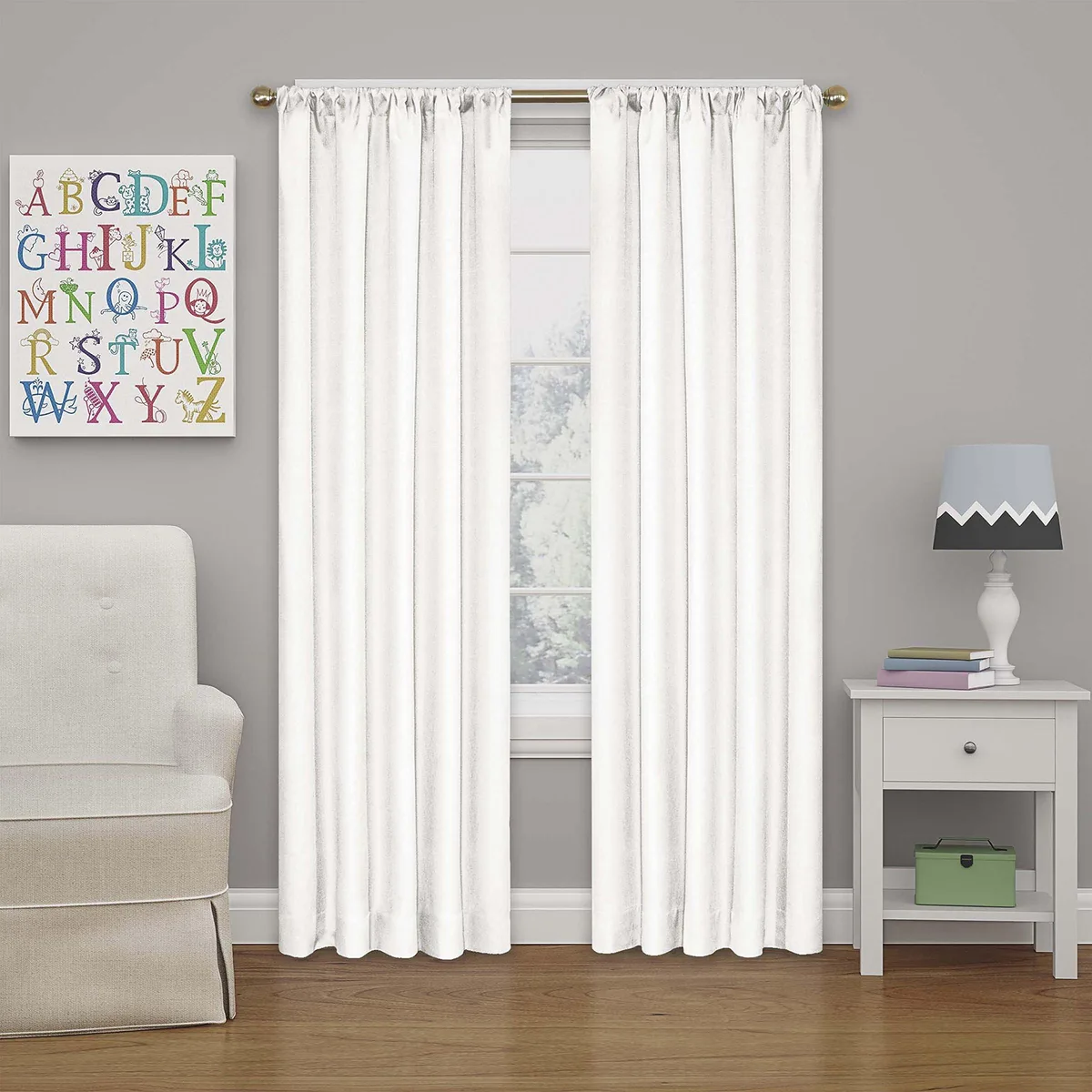 Single white blackout curtain panel with rod pocket header, 42 by 84 inches