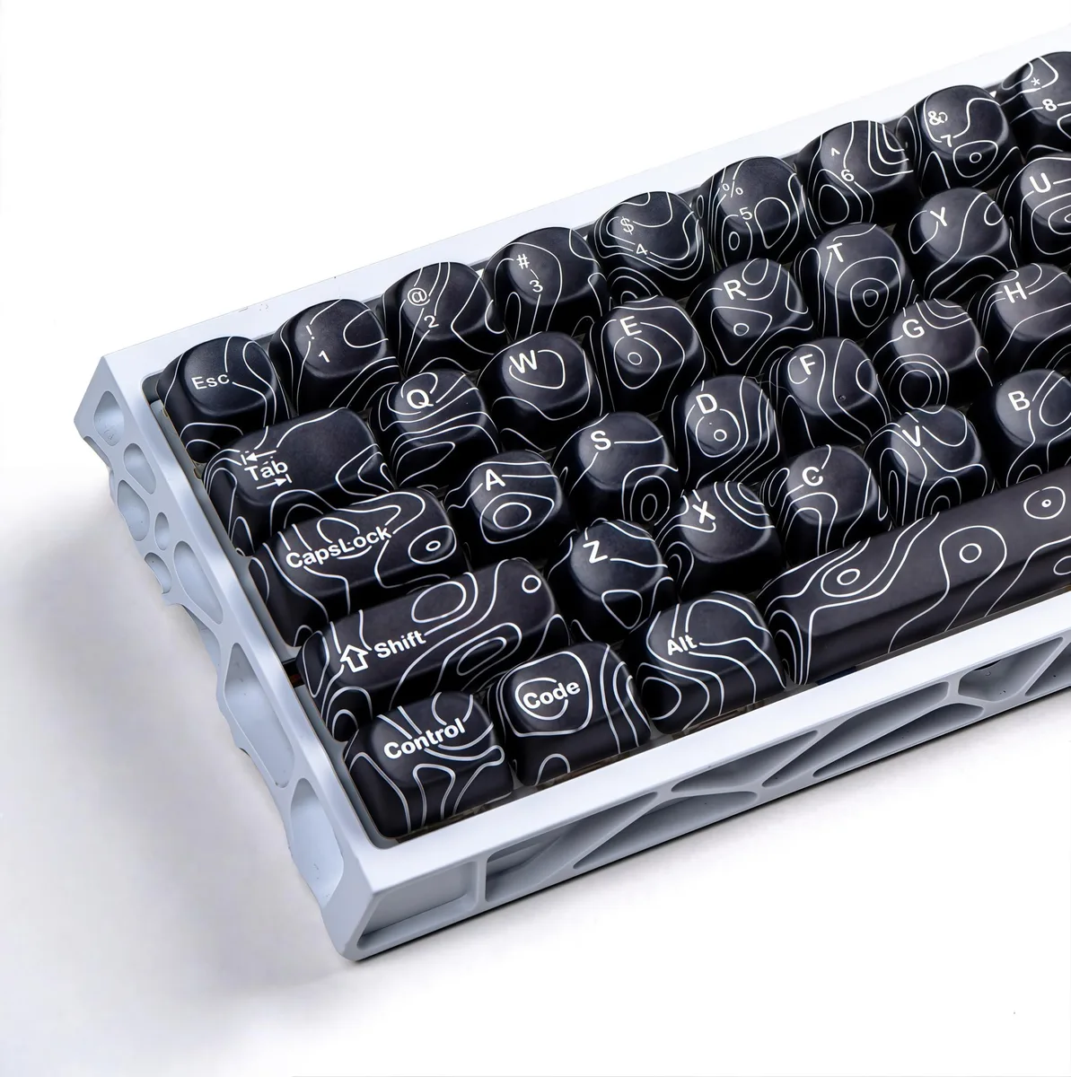Black topographic PBT keycaps in MOA profile, 129 keys with puller
