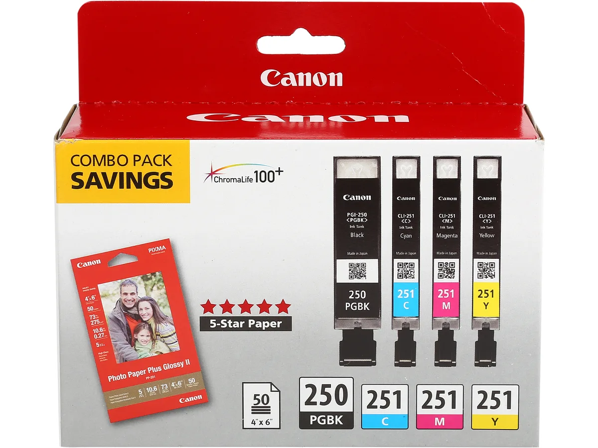 Boxed set of four Canon ink cartridges and 50 sheets of glossy photo paper
