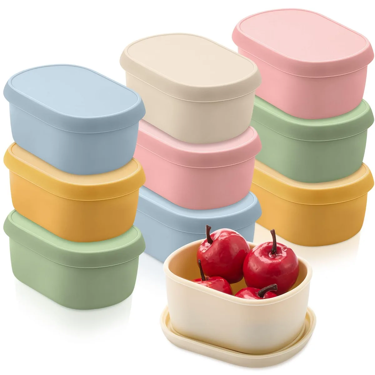 Ten small rectangular silicone containers with lids in pastel colours, stacked together