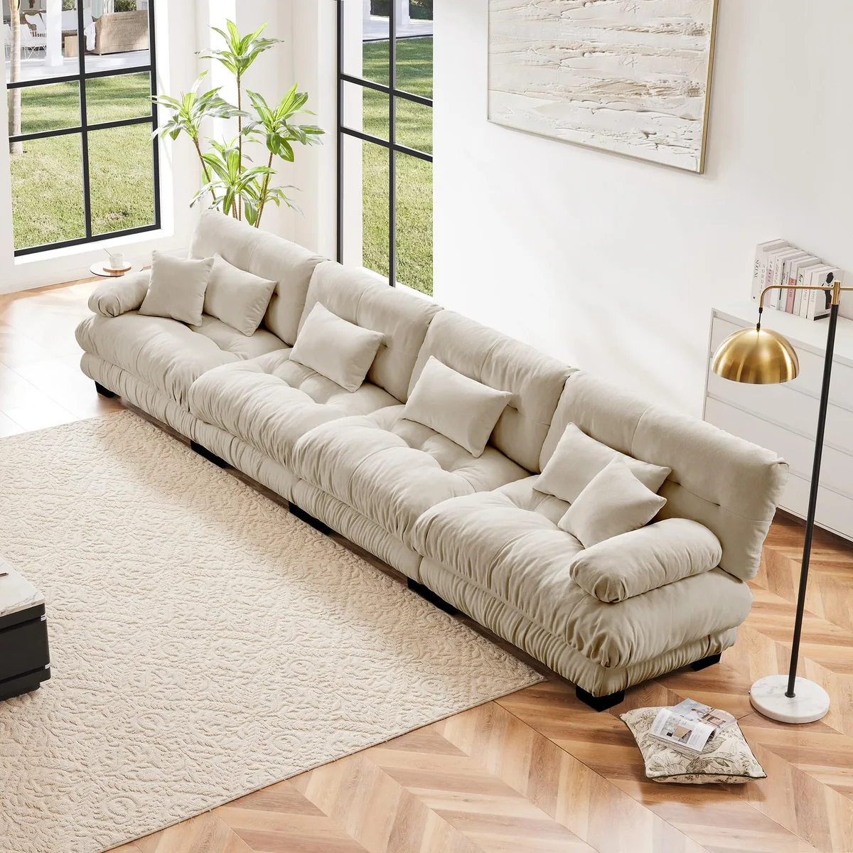 Four-seat modular sectional in light coffee chenille, deep seats, round bolster armrests, throw pillows included