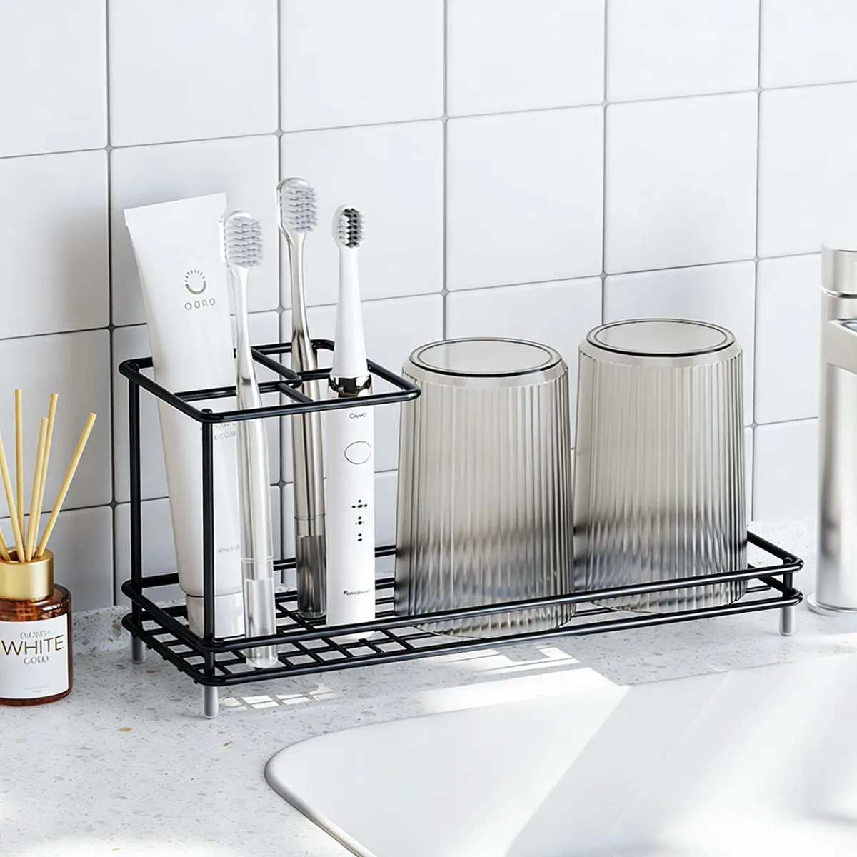 Black carbon-steel toothbrush holder set, rectangular freestanding stand with four slots and a larger compartment, painted finish