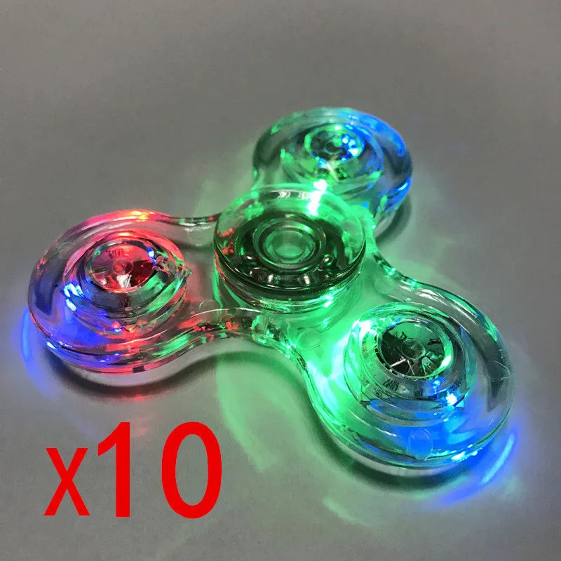 GuangDong SongYang Plastic Toys CO,.LTD GuangDong SongYang Plastic Toys CO,.LTD Transparent Crystal LED Fidget Hand Spinner Torqbar Brass 10pcs — product photo