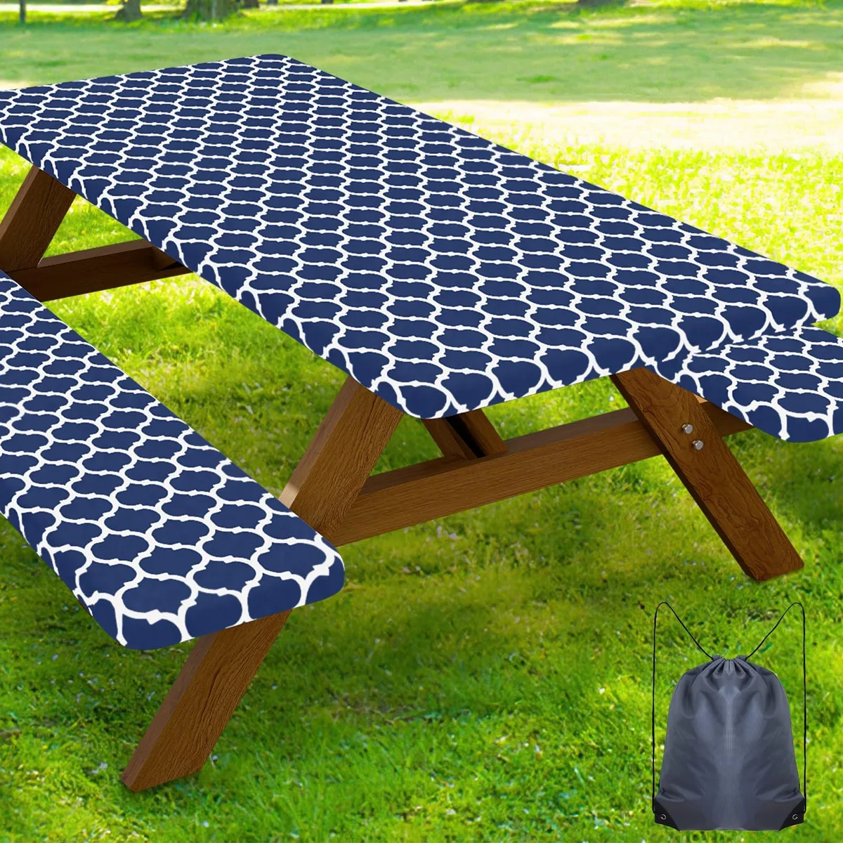 Navy fitted picnic table cover and two bench covers with elastic edges and drawstring bag