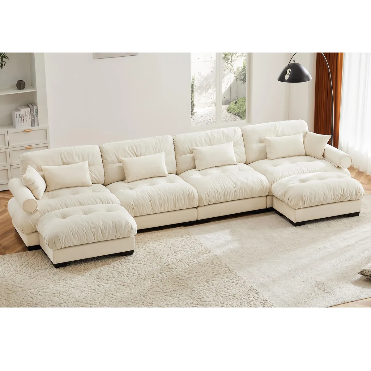 Cream U-shaped velvet sectional with movable ottomans and bolster armrests