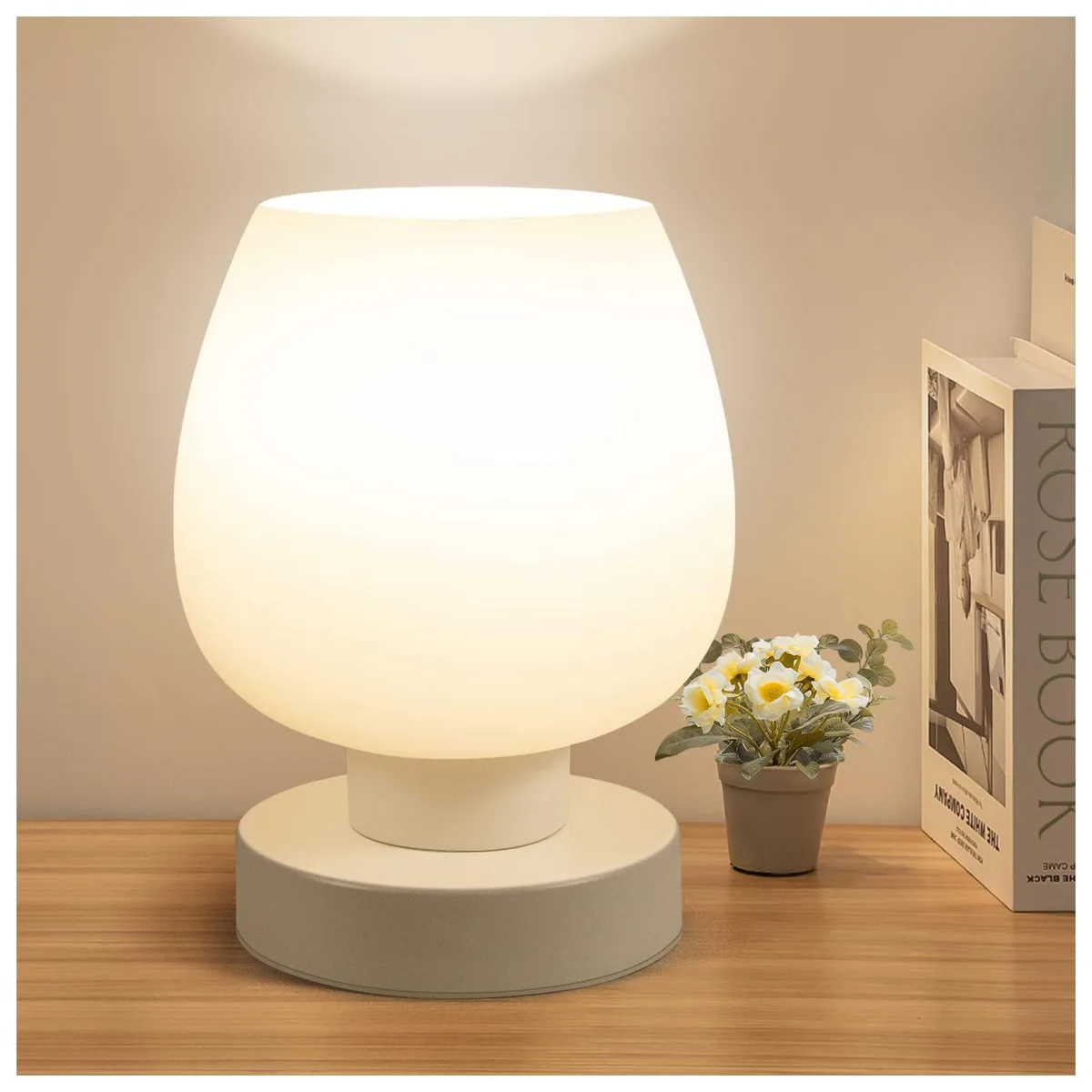 Compact 7.5 inch glass table lamp with glossy metal base and touch control