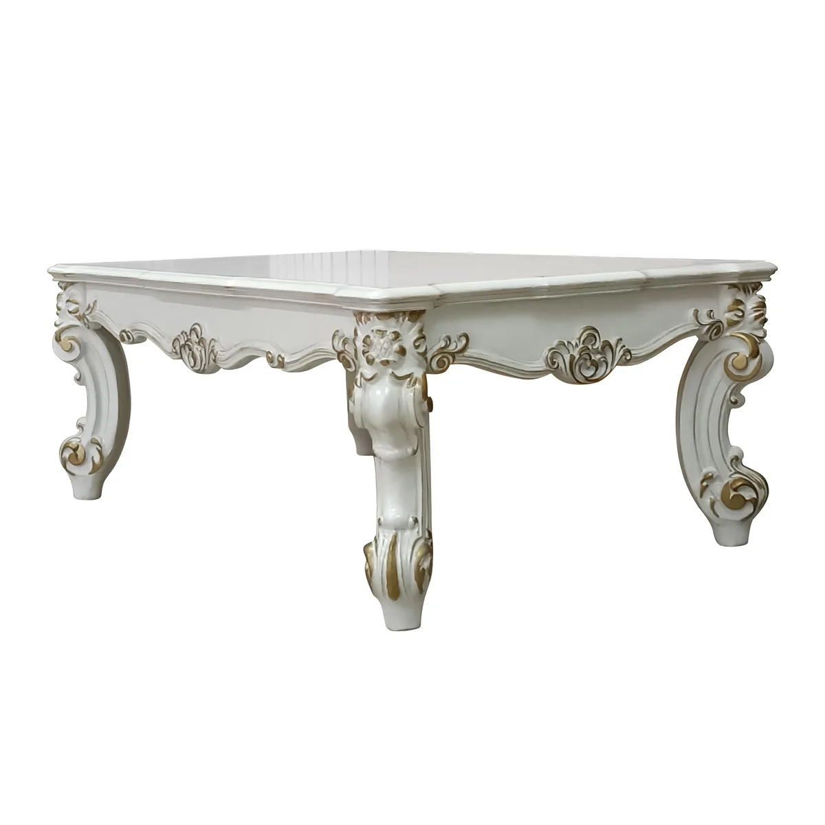 Rectangular off-white coffee table with scrolled legs and apron, resin and wood construction