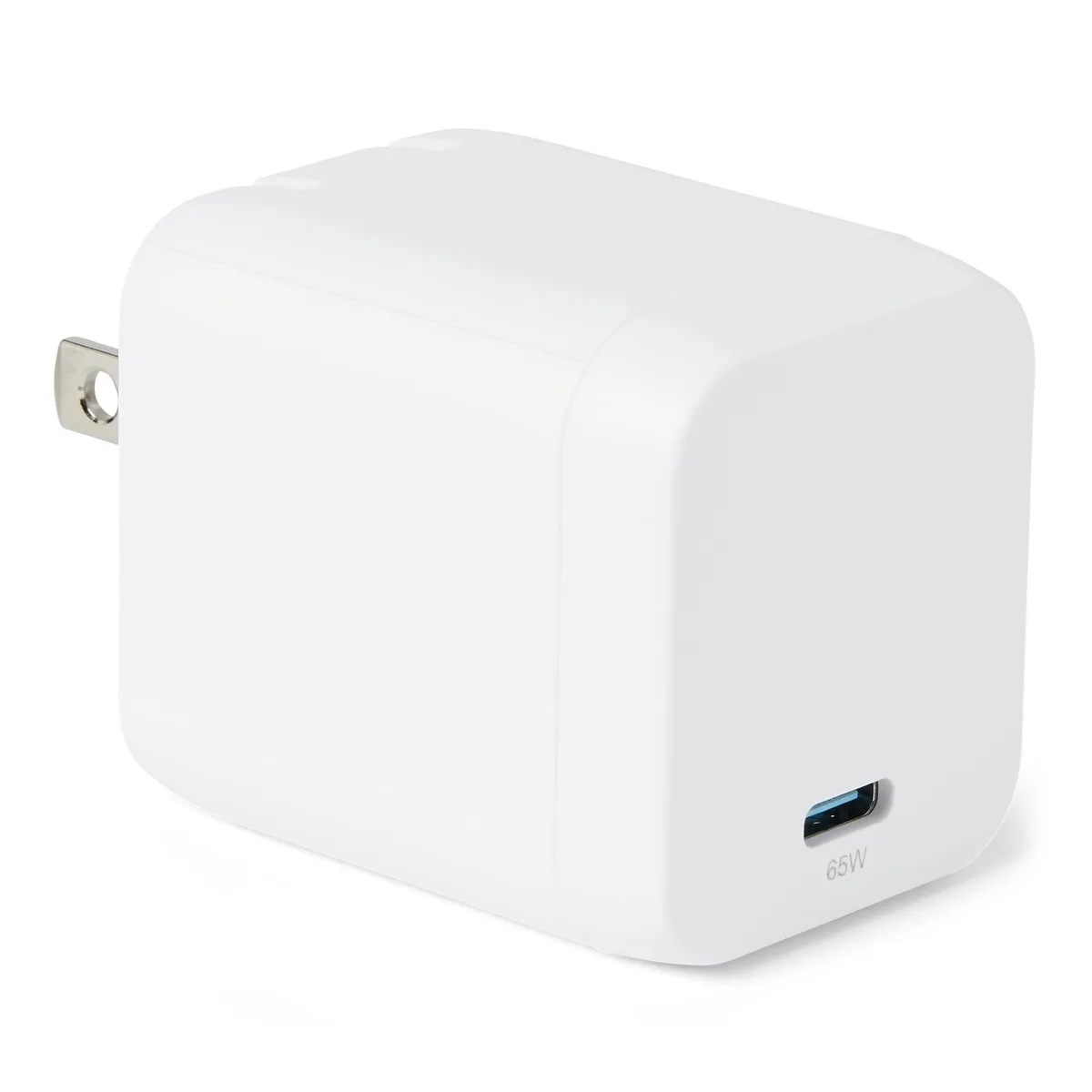 Small white cube-shaped USB-C wall charger with foldable plug