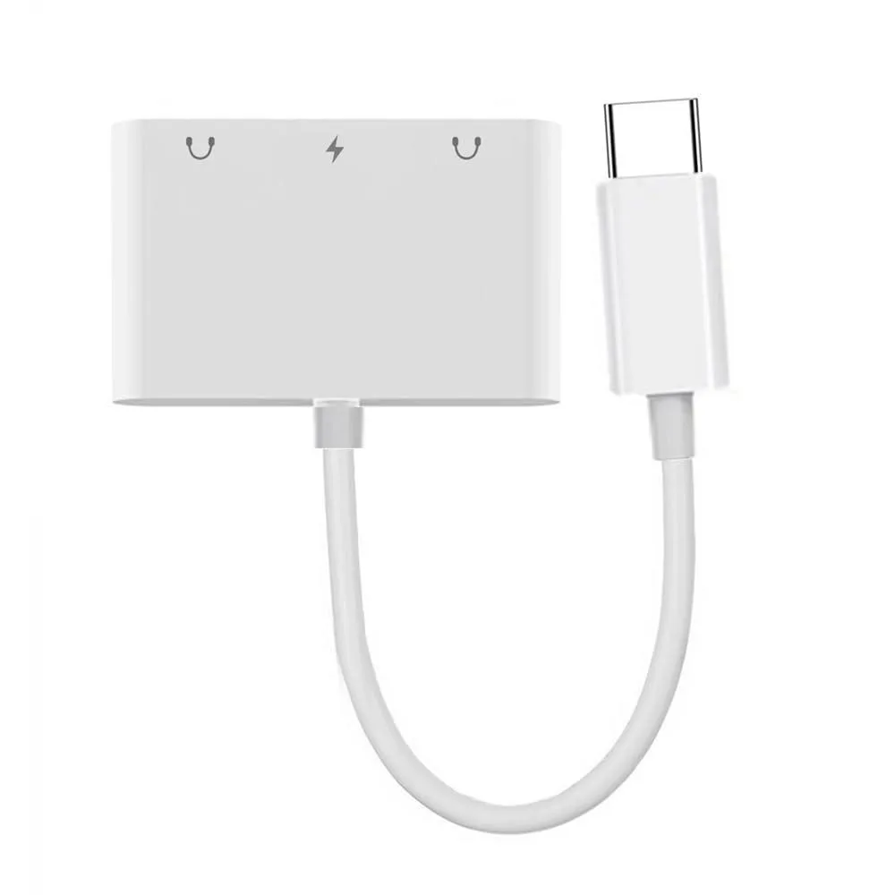 White USB-C dongle with two 3.5 mm jacks and a PD 15W pass-through port