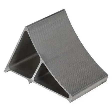 Silver aluminum wheel chock with grooved tread and triple-edged base, 7 inches wide