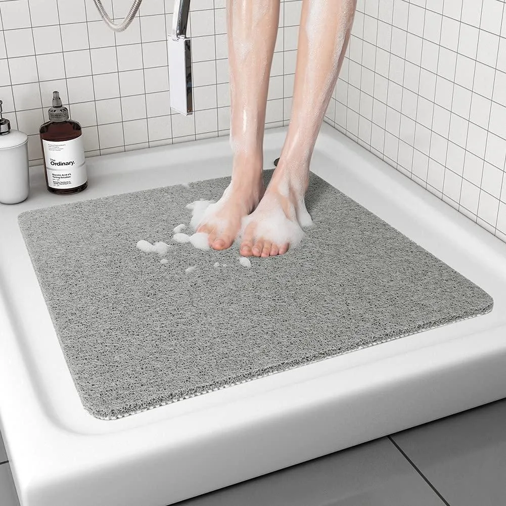Grey square shower mat, 24 by 24 inches, textured surface with drain holes, no suction cups