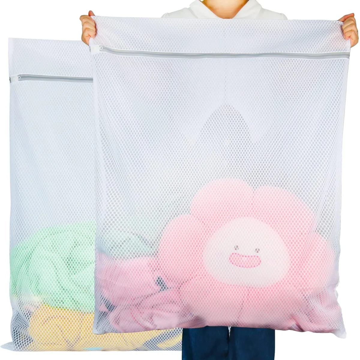 Two white honeycomb mesh laundry bags with zippers, each 27 by 35 inches