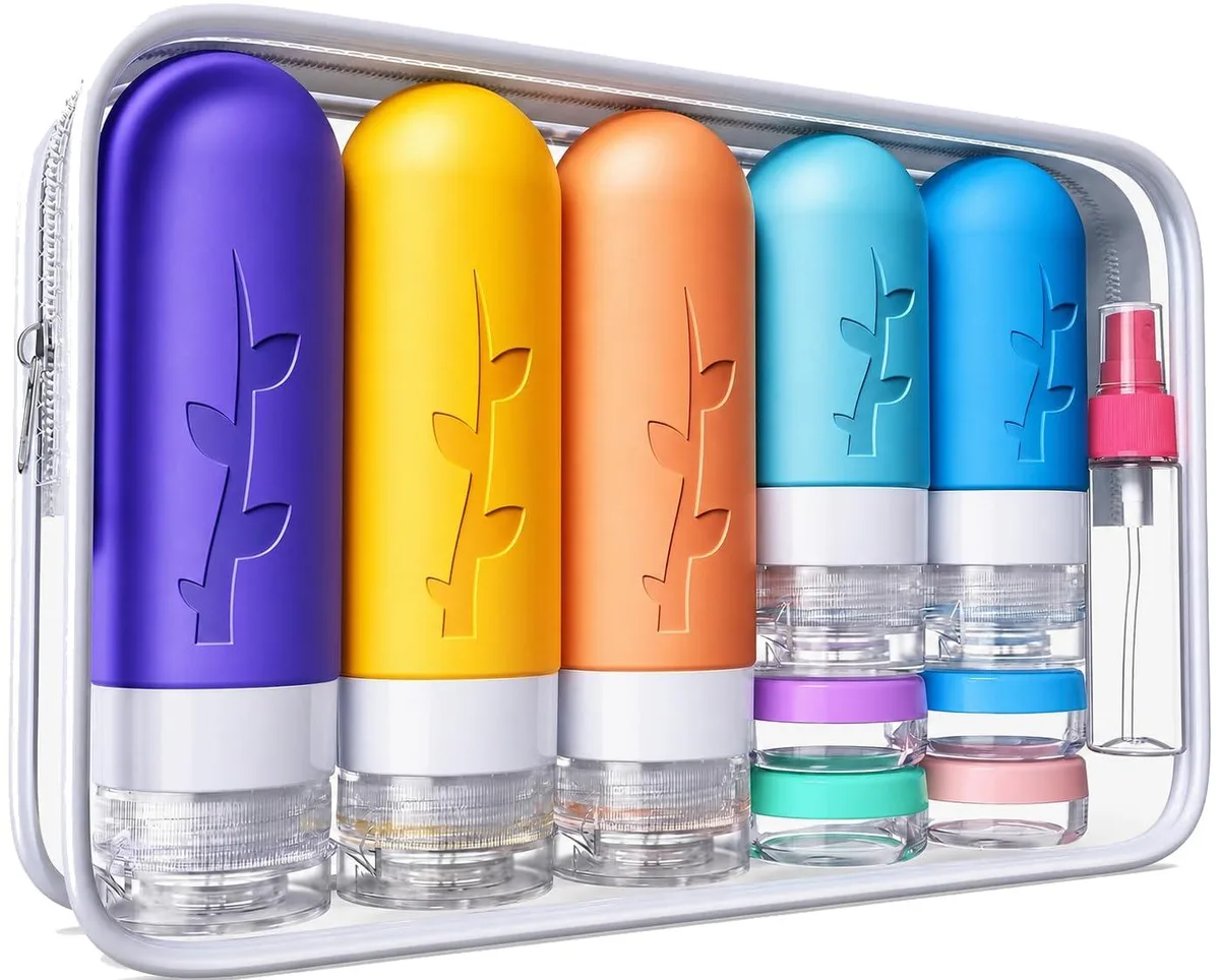 A 19-piece travel bottle set with multi-color silicone bottles, spray bottles, cream boxes, a transparent waterproof bag, funnel